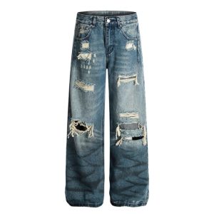 Washed blue ripped jeans for women